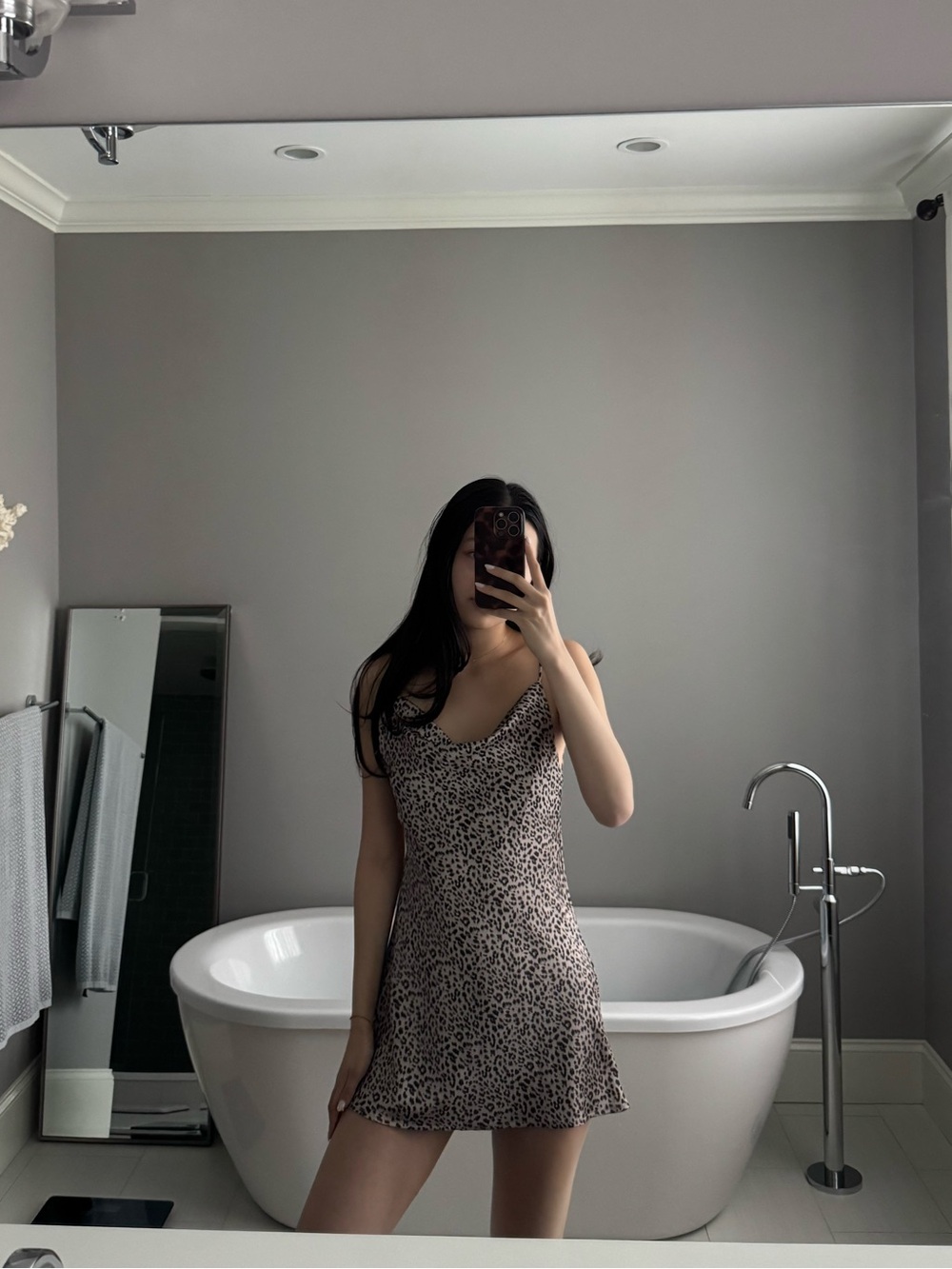 Princess Polly cheetah print mini slip dress.